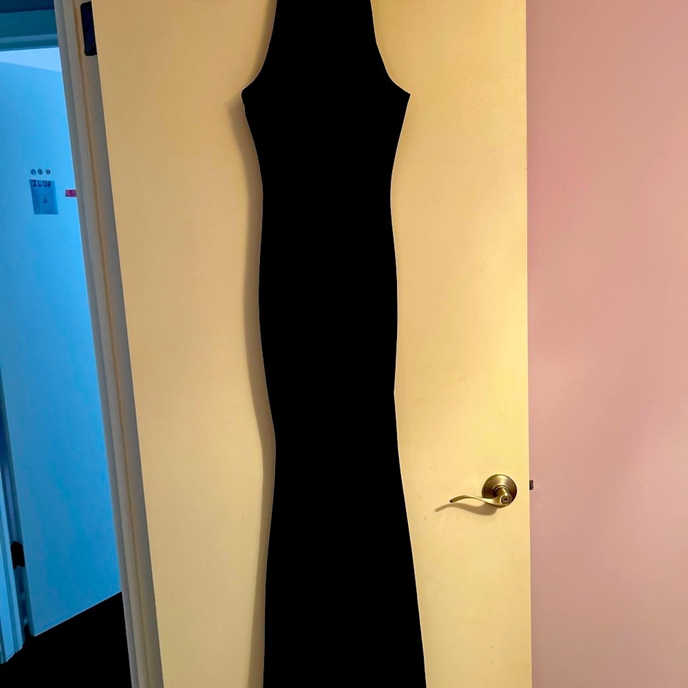 Mermaid style black dress with beautiful neckline